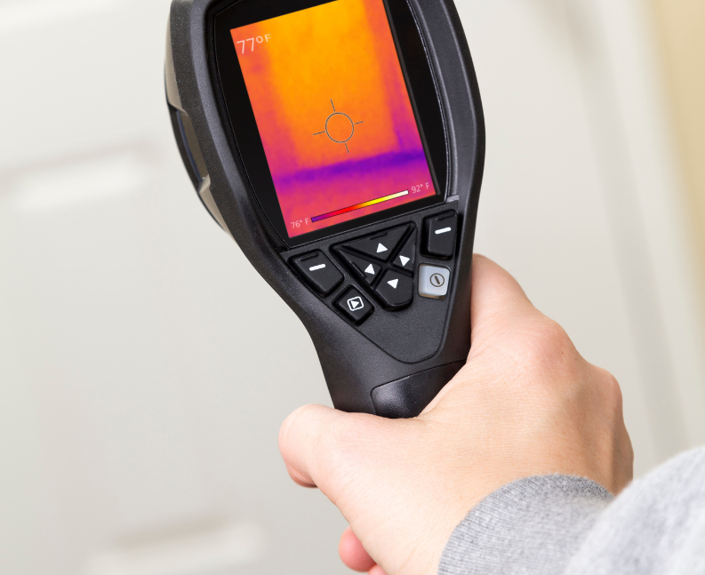 conducting an energy audit with a thermal gun