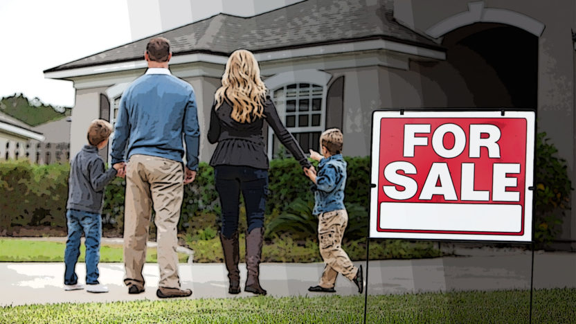 Family in front of home for sale