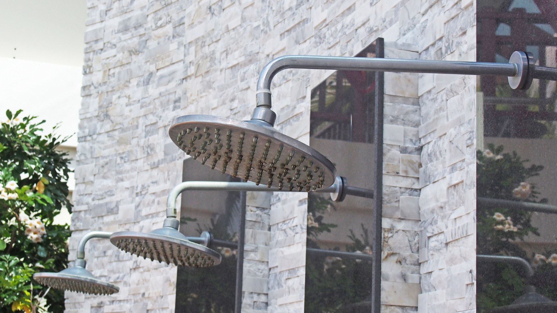 Dealing with Sand and Salt Buildup: Cleaning and Maintaining Your Outdoor Shower in Sewall's Point