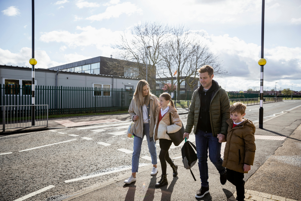 parents walking children to school