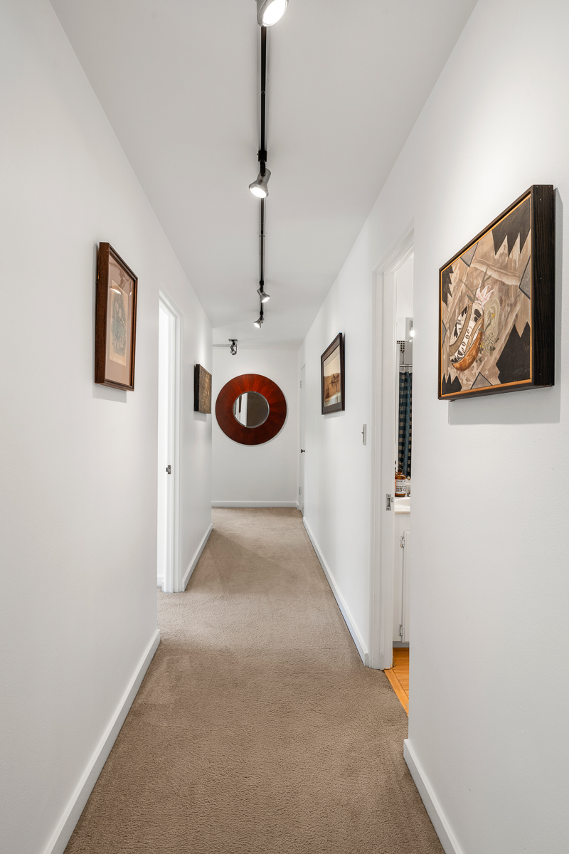 Track Lighting Makes the Perfect Art Gallery Wall White walls await your own art display wall