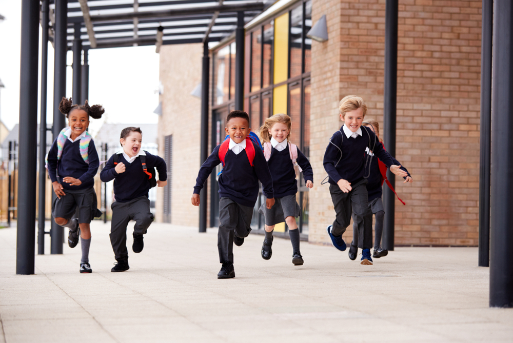 students running in school