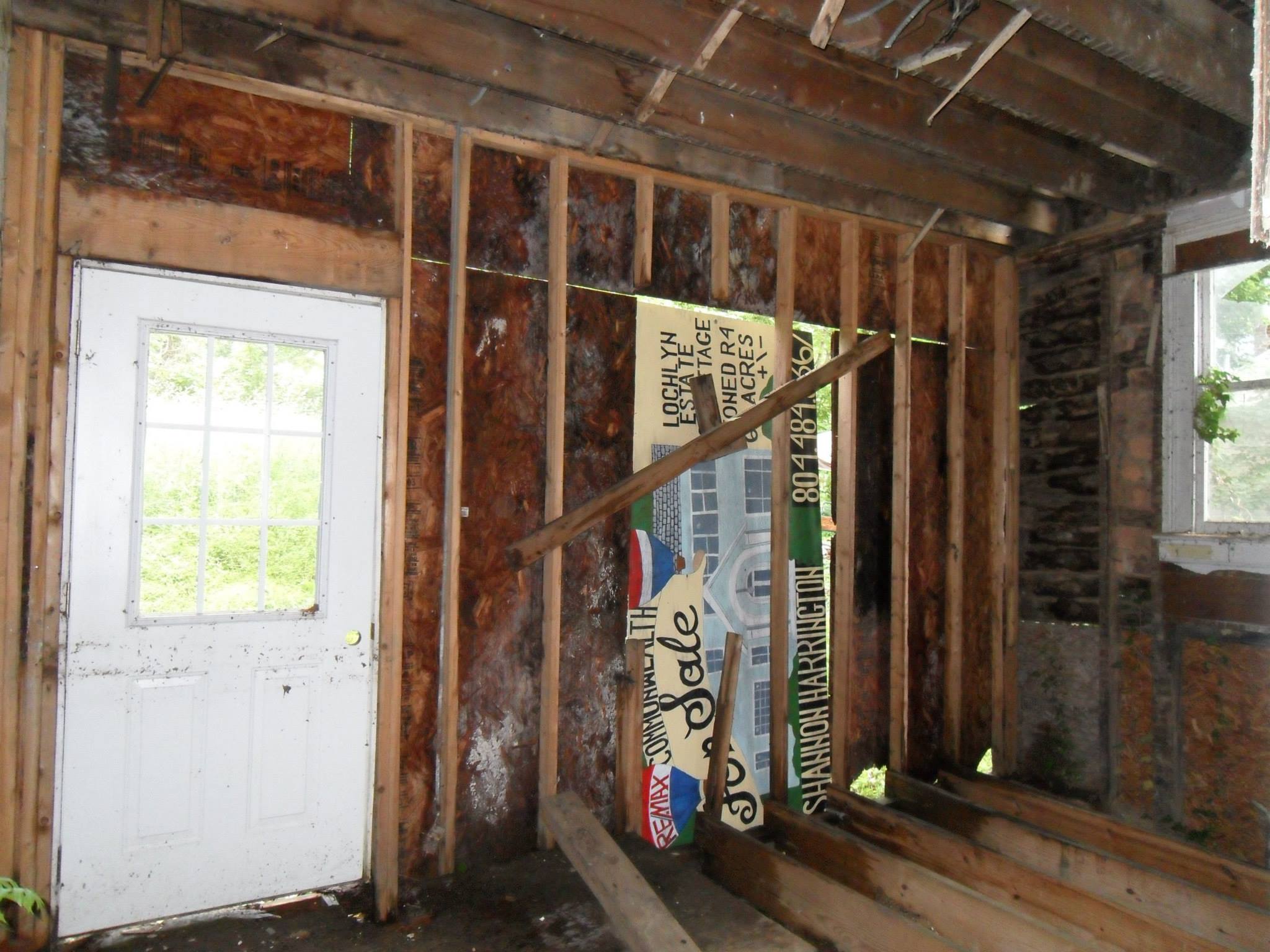619 frederick st before renovation - door to backyard