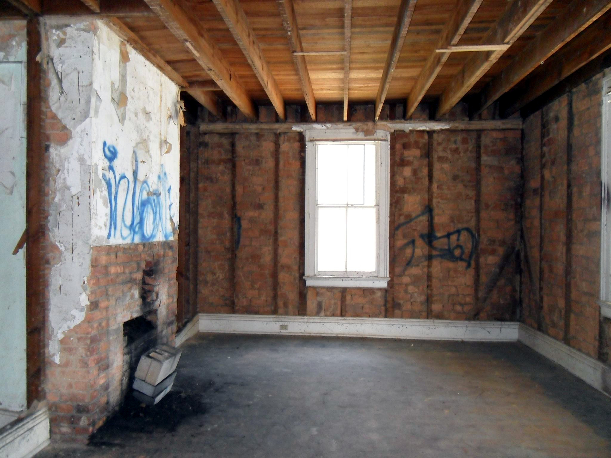 619 frederick st before renovation - bedroom