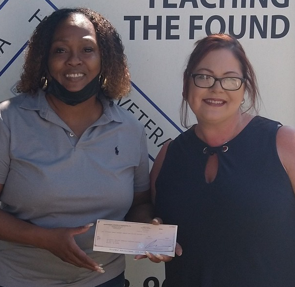 Amy McBride with TEAM REIGN GIVES BACK to the Northeast Georgia Homeless Veterans Shelter
