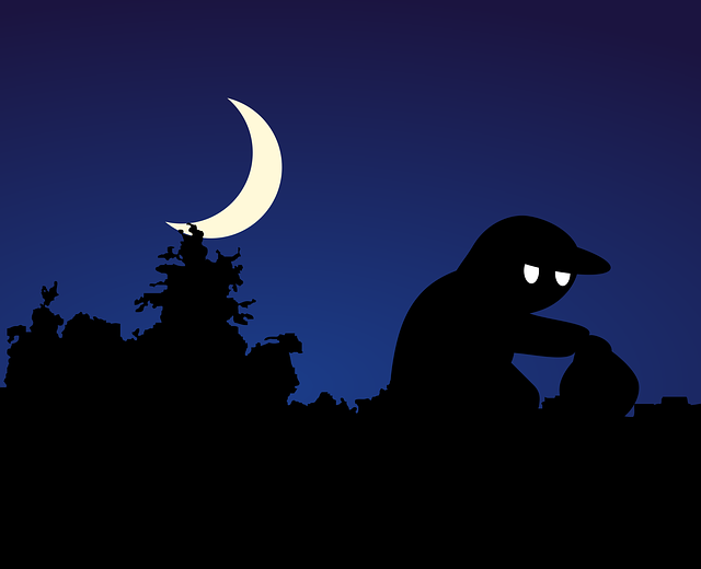 Thief in the night with moon in the background