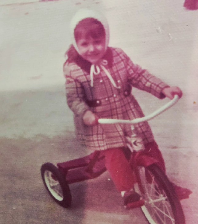 Chris Dixon on her bike at Nanny & Grandaddy's house