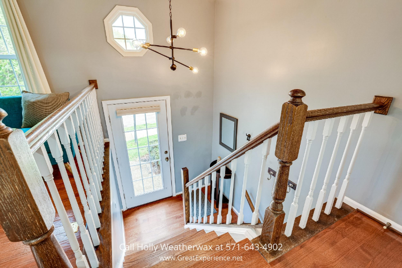Homes in Reston VA - Fantastic natural light will greet you as you follow the hardwood floors that lead up to the main level. 