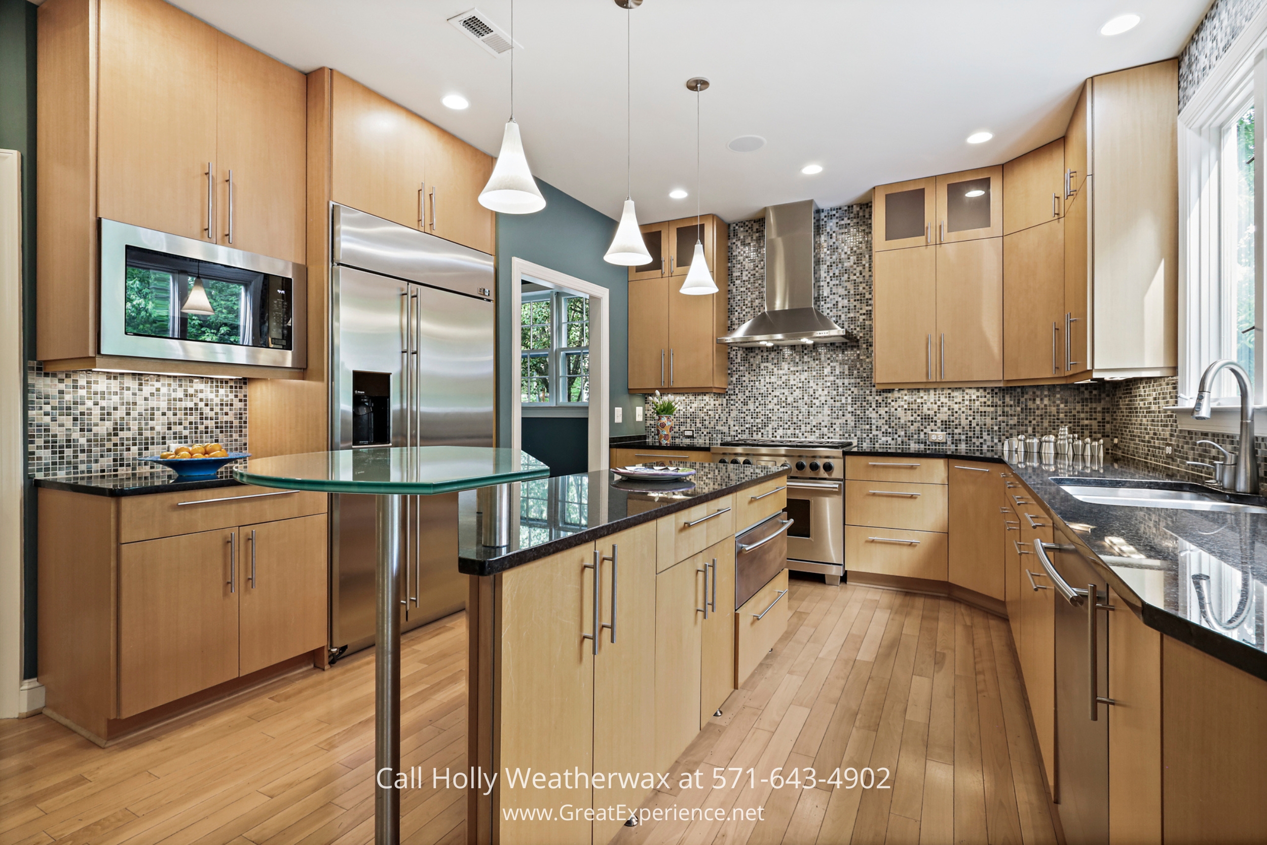 Warm and inviting kitchen with elegant wooden cabinets and sleek stainless steel appliances