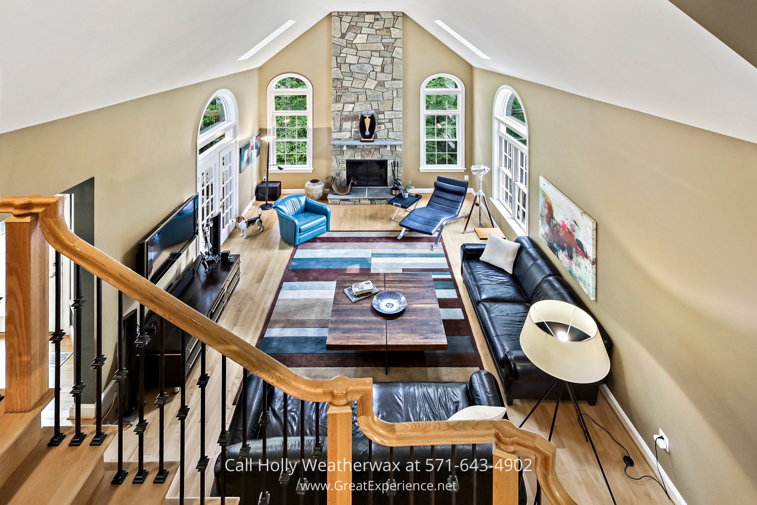 Cozy family room adorned with furniture and a warm fireplace