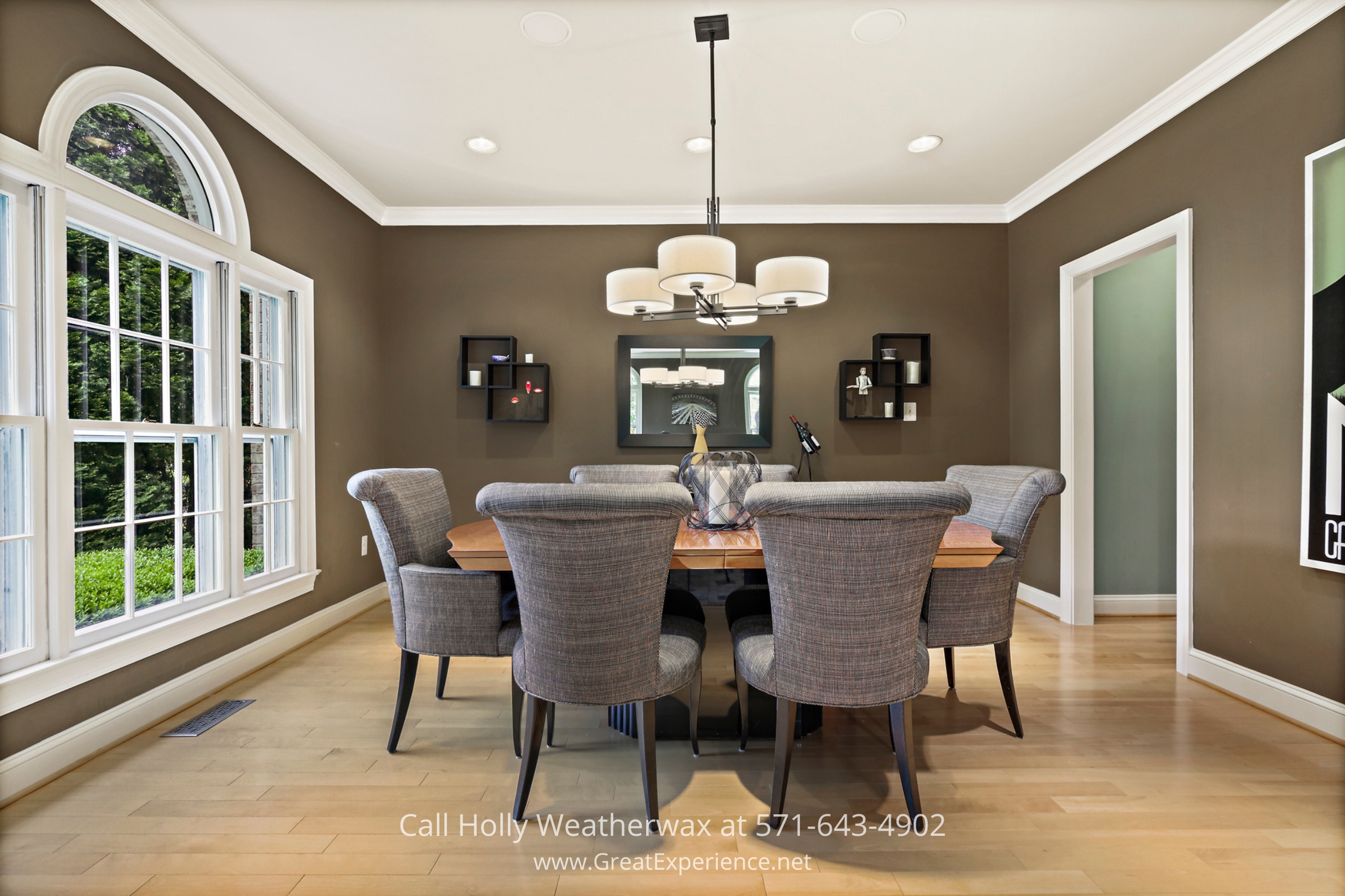 Elegant dining room showcasing a stylish table and chairs