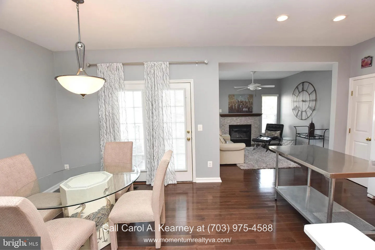 Open Dining Area – 25474 Brickell Dr Open dining area at 25474 Brickell Dr in South Riding, Chantilly, VA, featuring hardwood floors and an easy flow into the kitchen and family room.