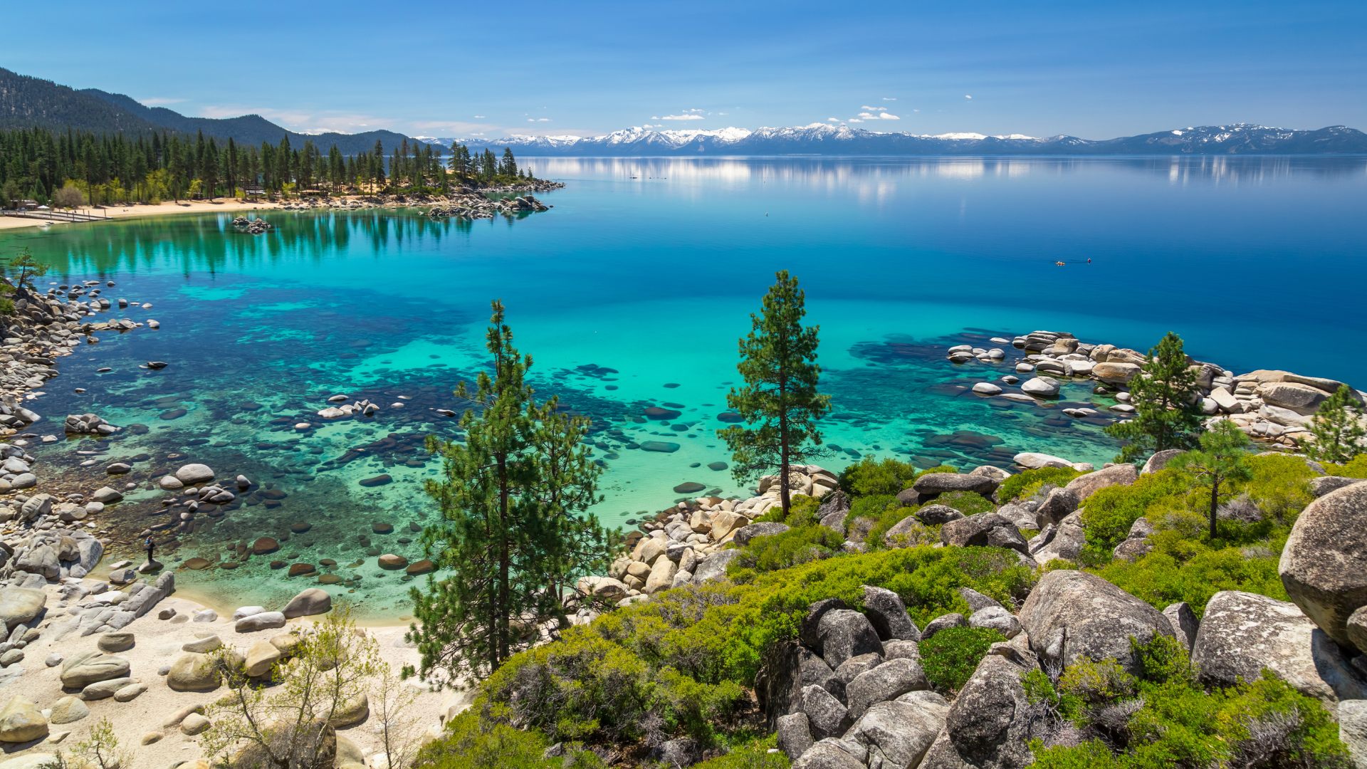 Tranquil bay of Lake Tahoe in Tahoe National Forest, California, a great stop on a road trip from Reno.