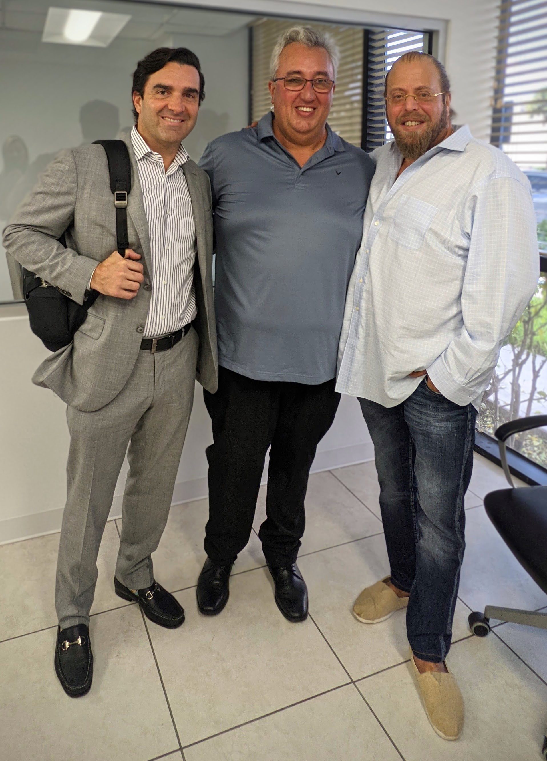Gil Dezer, Sebastian Tettamanti and Fernando Pettineroli Luxury real estate advisor Fernando Pettineroli with Bentley Residences developer Gil Dezer and top broker Sebastian Tettamanti at Dezer Platinum Realty in Sunny Isles Beach.