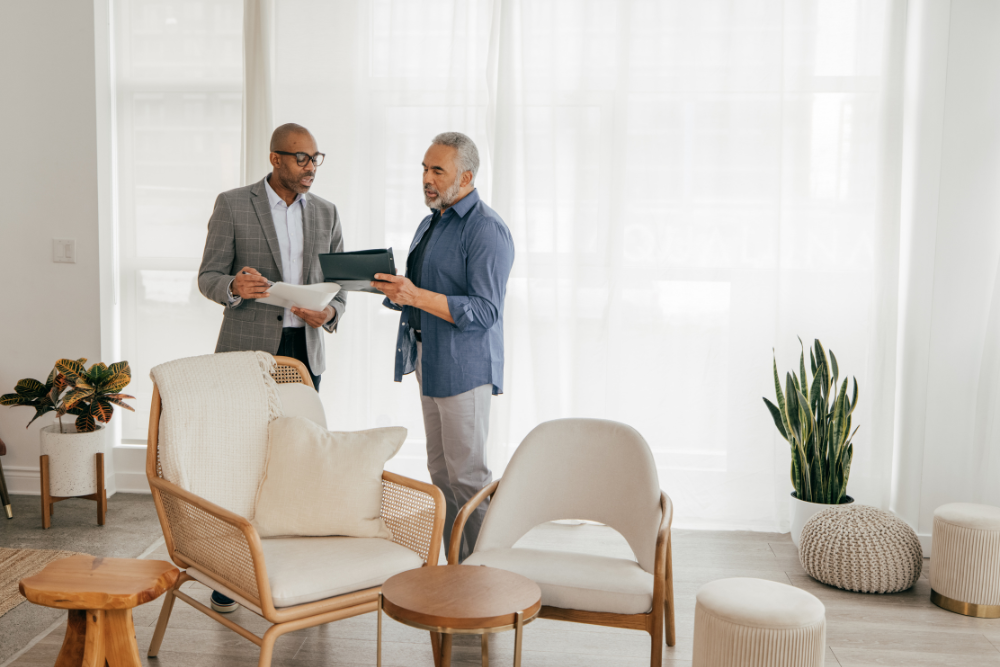 Realtor discussing to homeowner how to strategically list for success