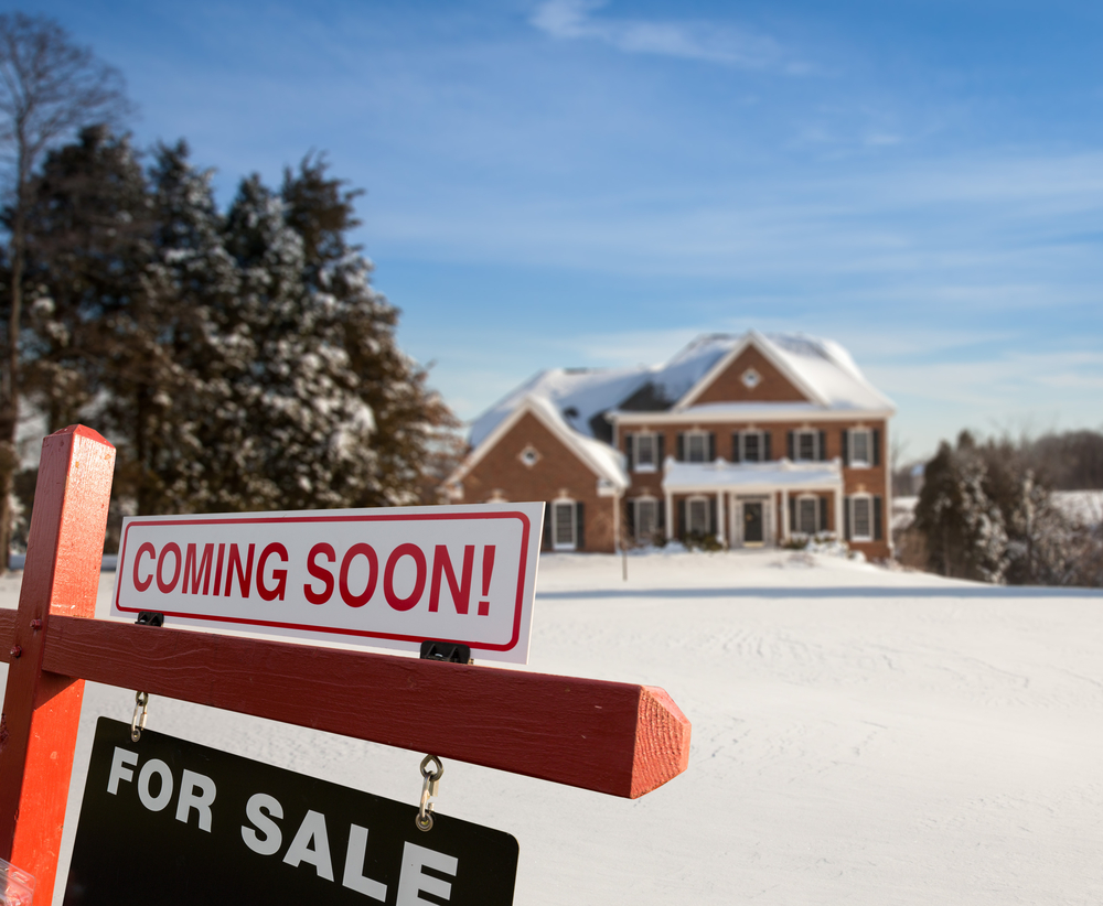 coming soon sign in front of the house