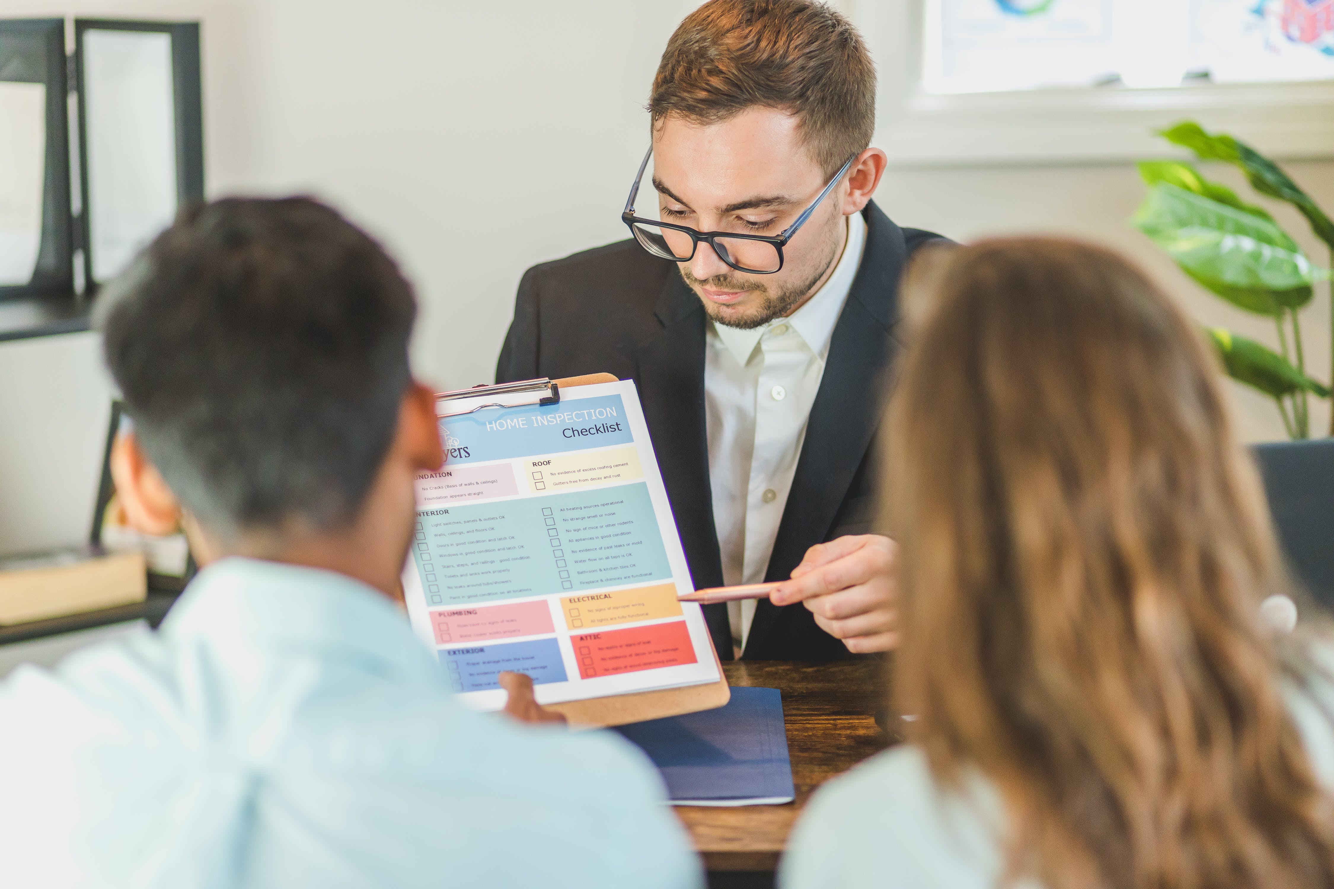 an agent discussing with the buyer