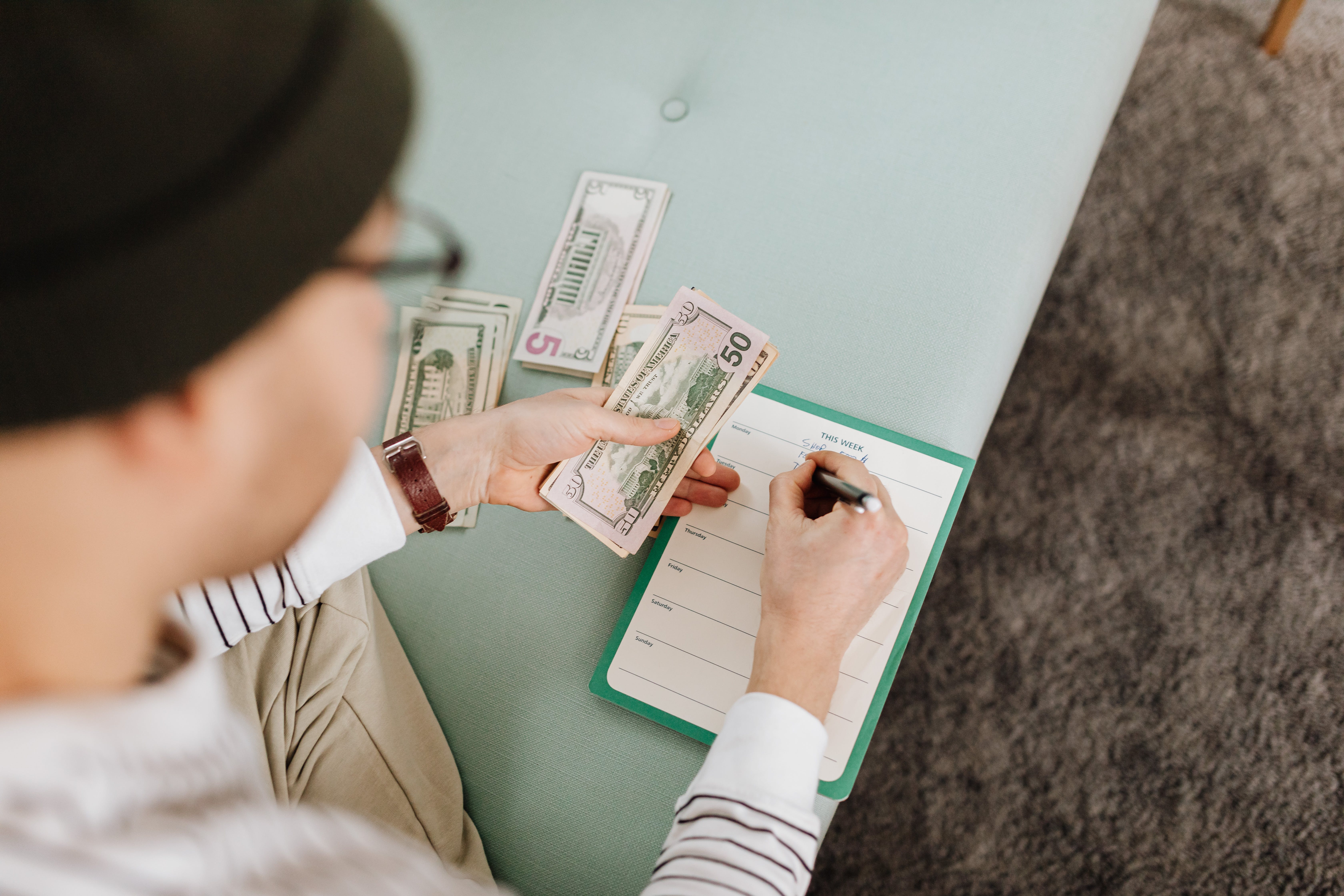 a man computing his expenses