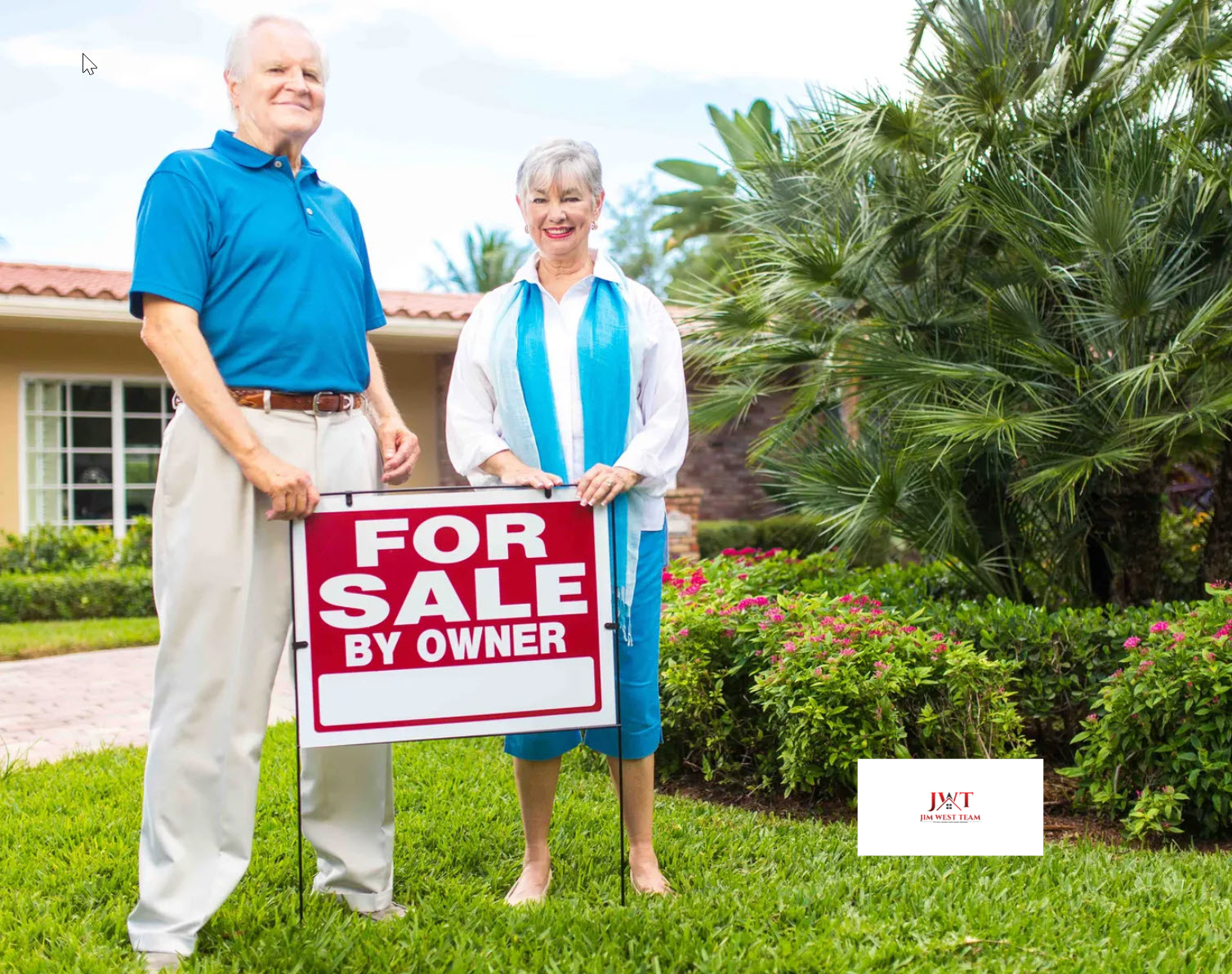 Older couple standing in front of their home with a red For Sale by Owner sign, representing FSBO sellers in Marysville, Ohio