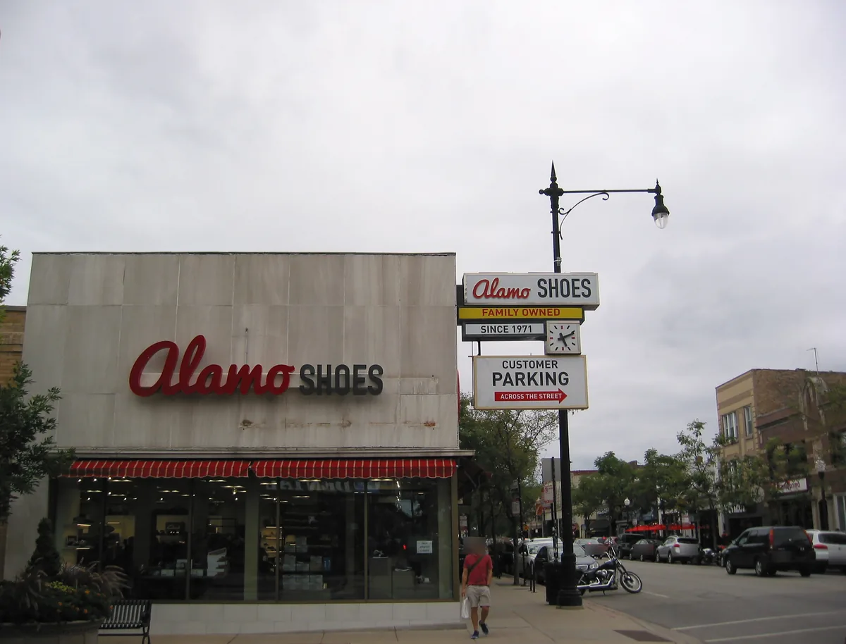 Vintage storefront signs and street lamps along N Clark St in Andersonville, Chicago