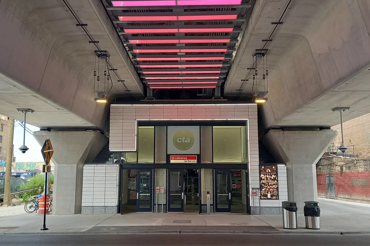 Entrance to the rebuilt CTA Lawrence Red Line station beneath the elevated tracks in Uptown, Chicago