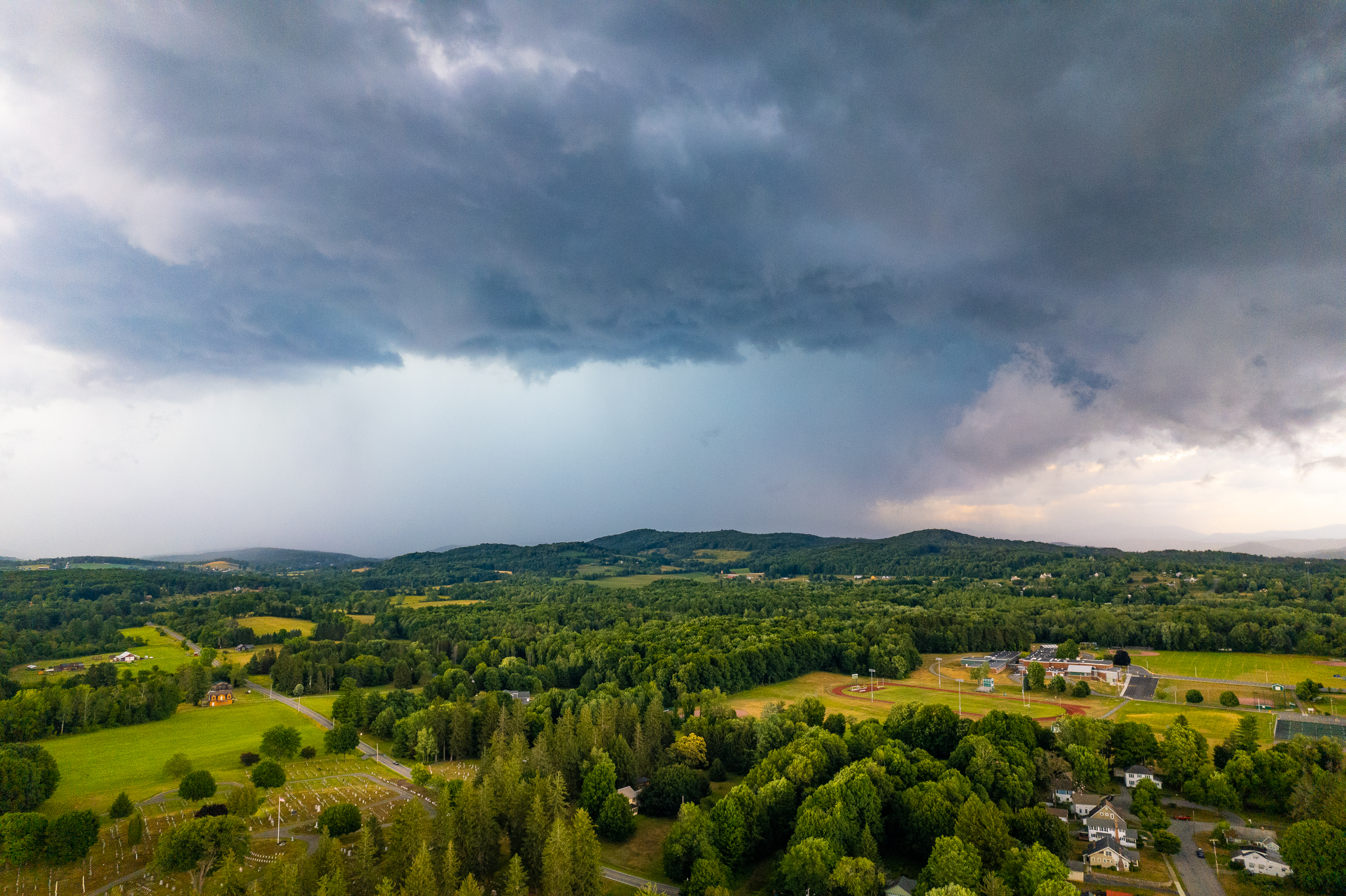A photograph of a storm looming above Greenwich, NY by Justus Waldron, photographer in upstate NY.