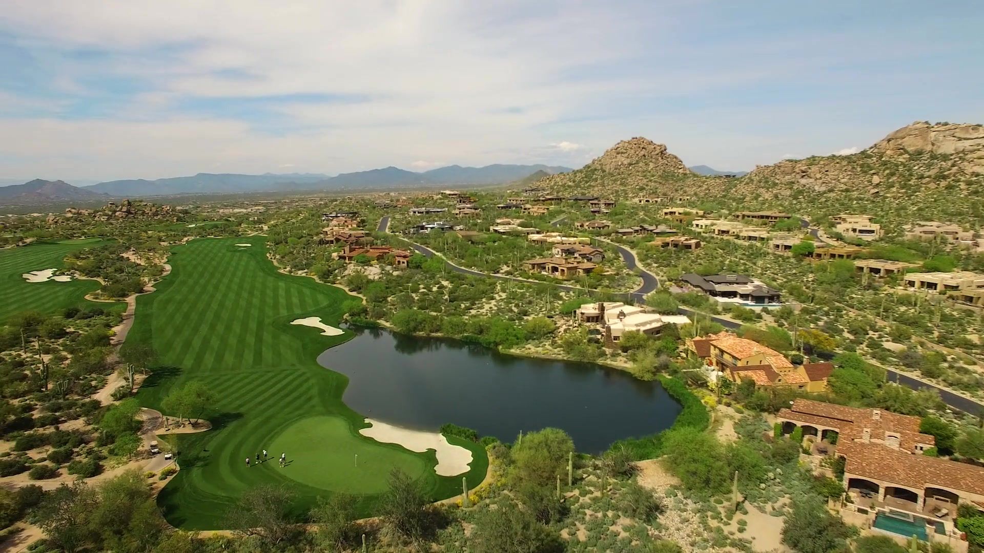 Aerial view of a North Scottsdale golf course and desert homes
