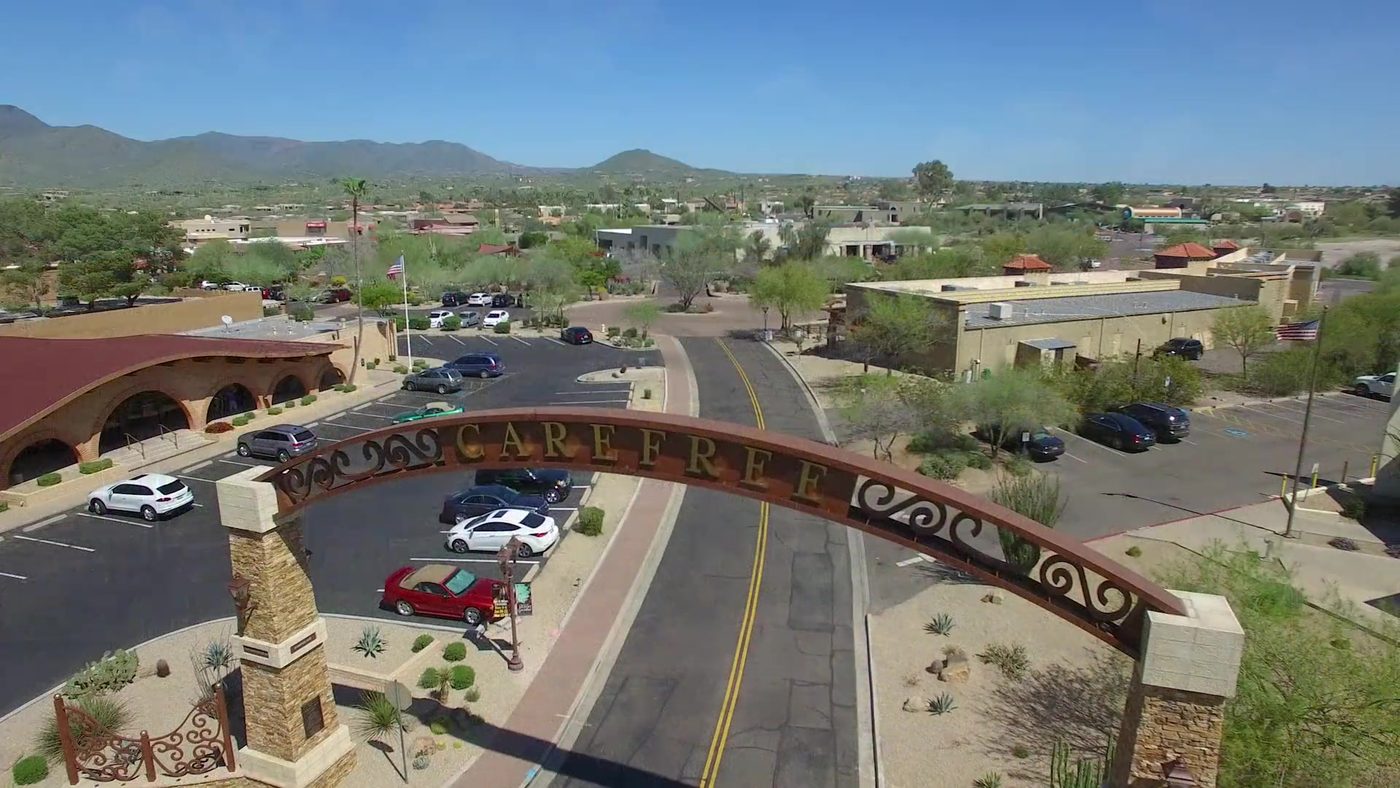Aerial view of the Carefree arch over the road into the town center