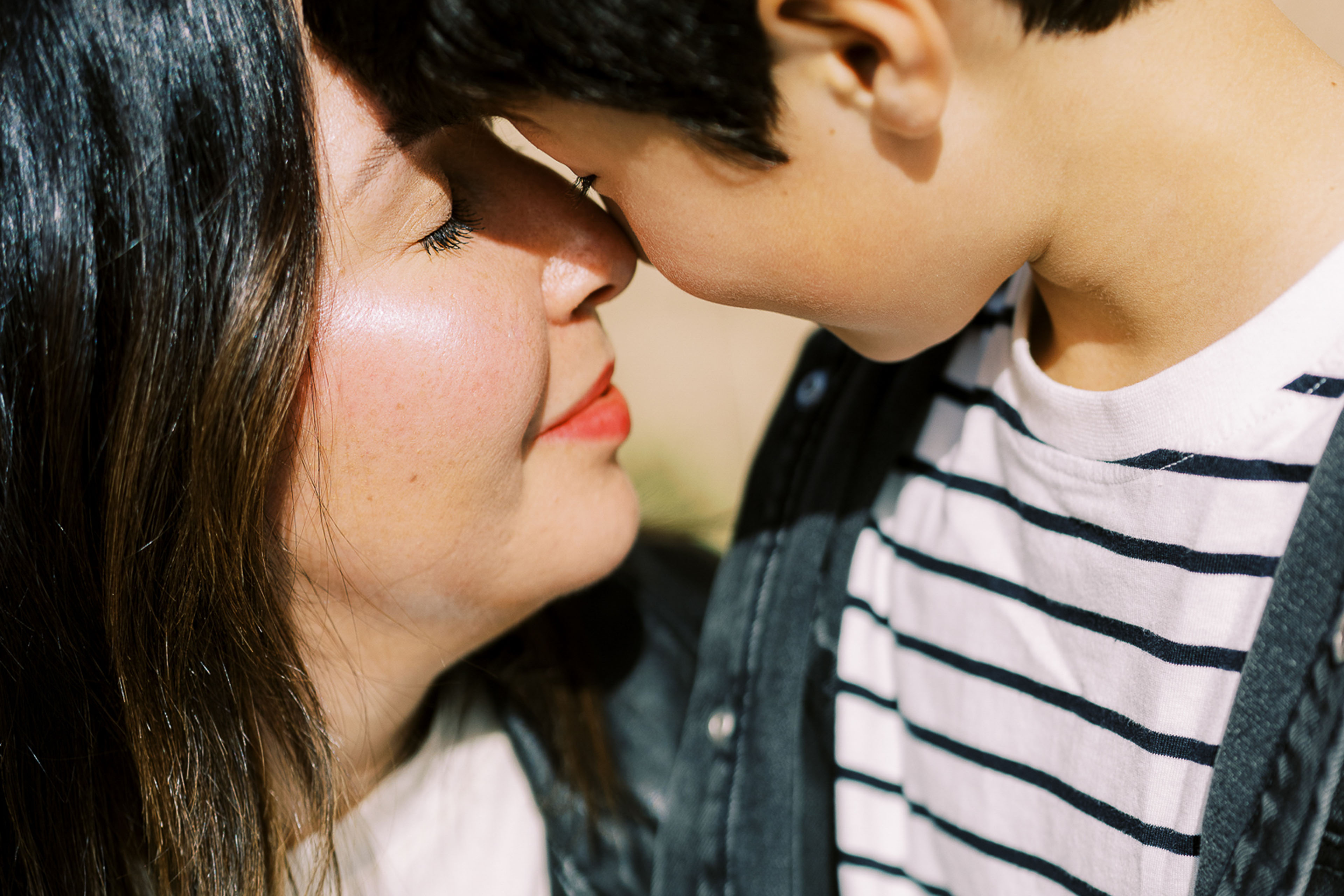 a single mother sits with her child