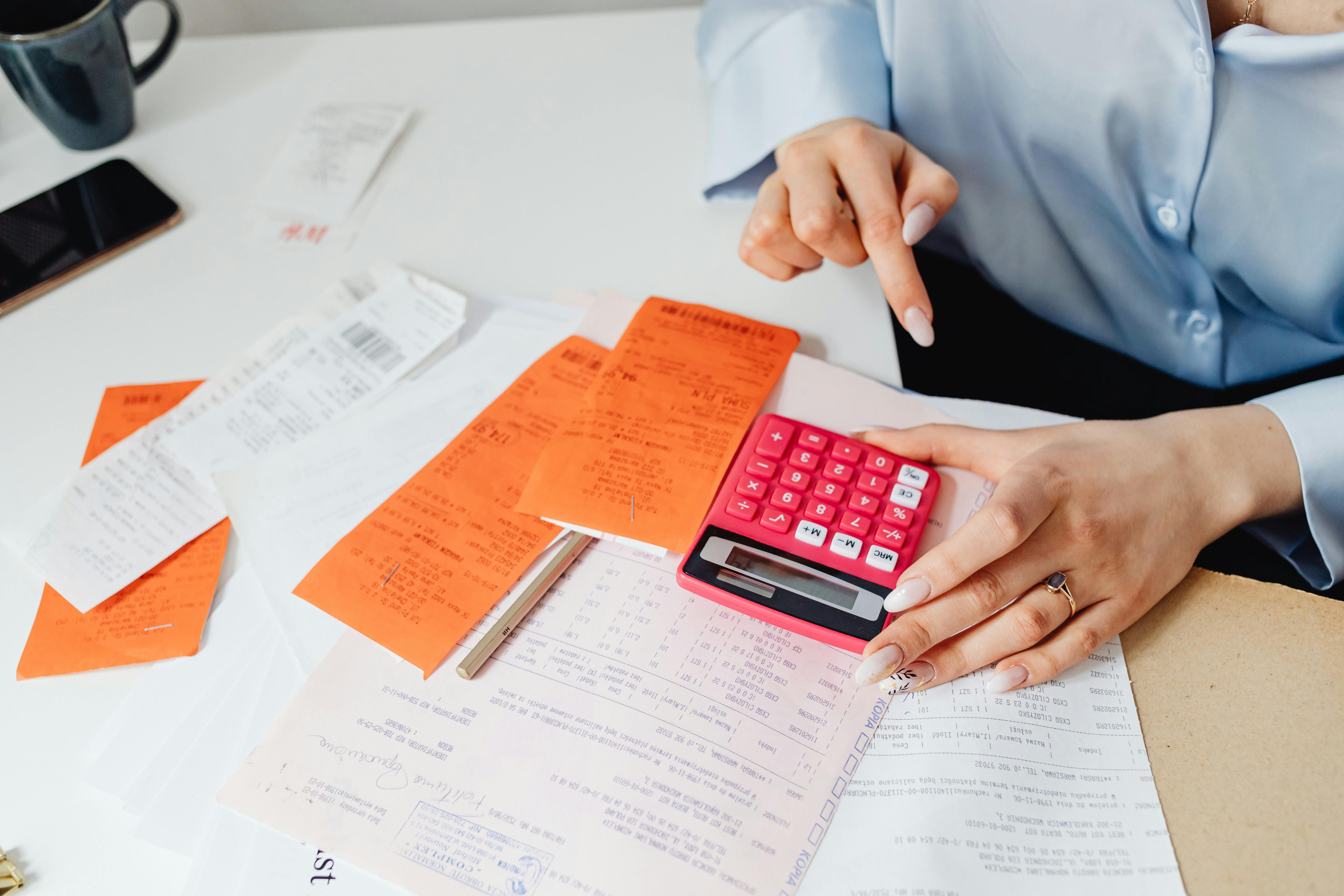 A woman calculating expenses